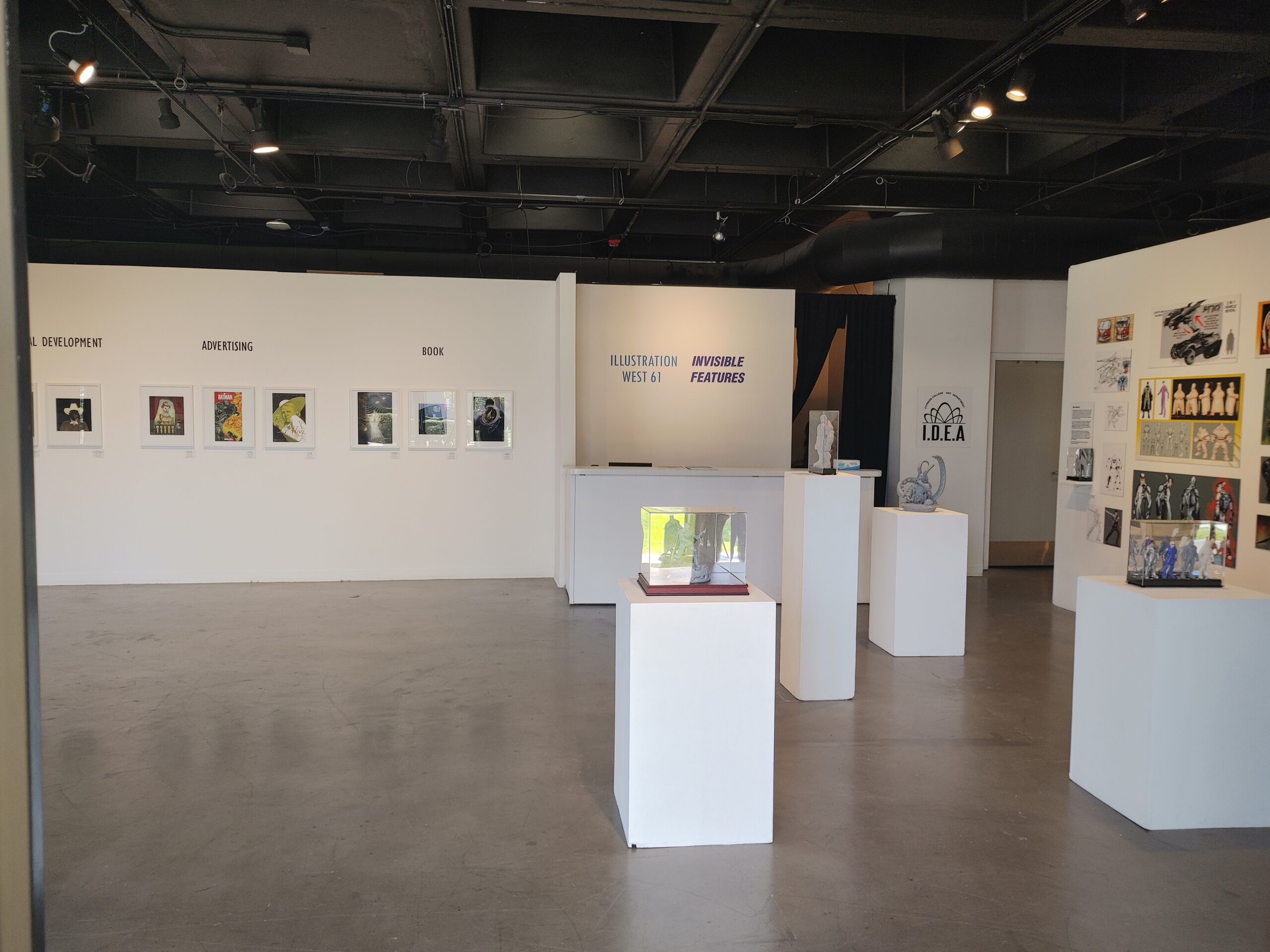 Students experience hands-on opportunities setting up an art gallery ...